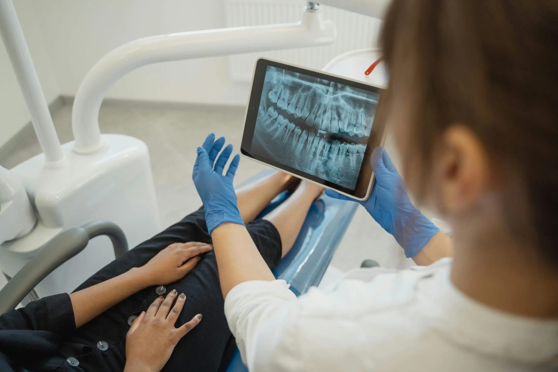 Relaxed patient and clinician dental care moment